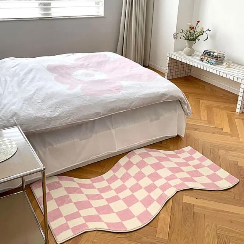 Dywan z pastelowym wzorem w kratkę z zakrzywionymi krawędziami